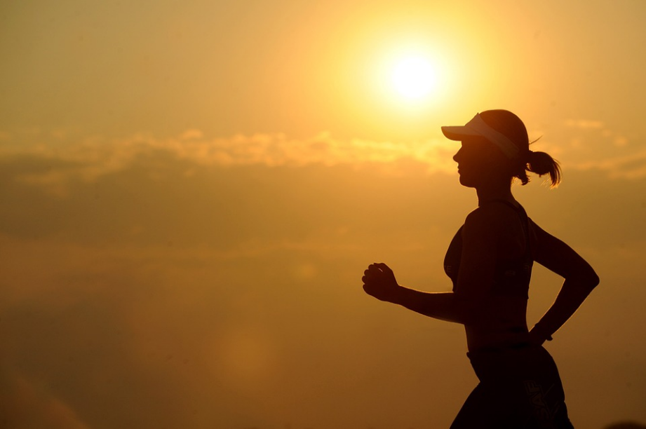 a silhouette of a jogger